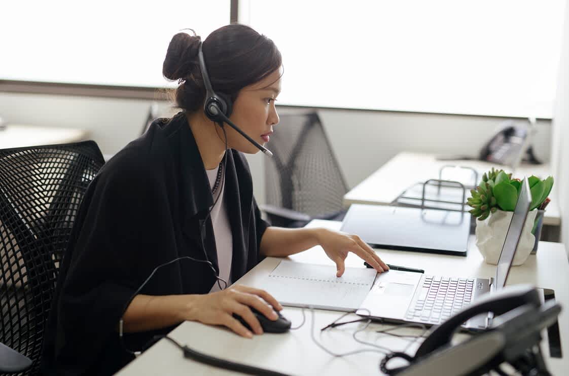 - Housecall Pro Female receptionist answer calls for a business
