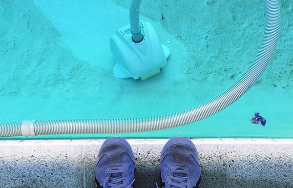 Pool cleaner vacuum at bottom swimming pool