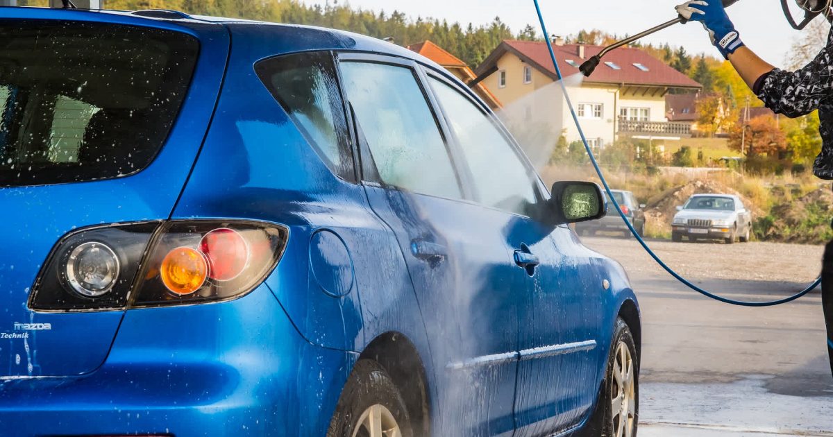 pressure washing a car