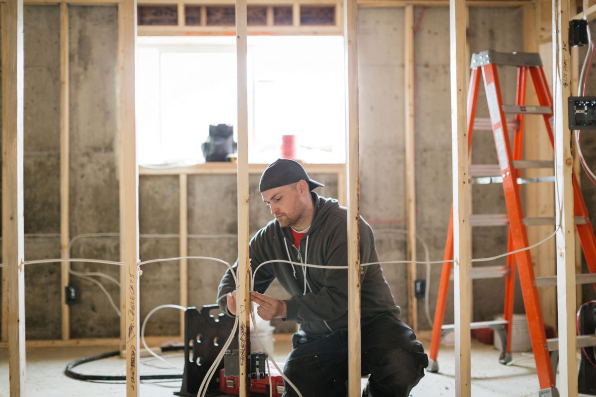 electrician working in a new construction residence