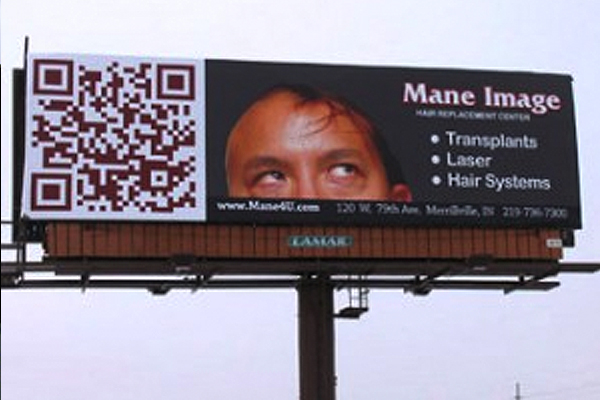 - Housecall Pro picture of a billboard where the text is too small