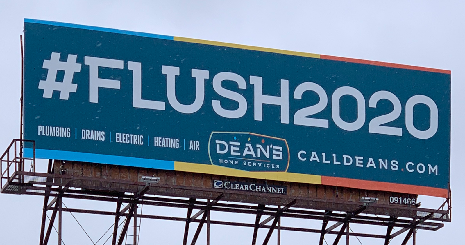 - Housecall Pro image of a using a hashtag on a billboard for a plumber