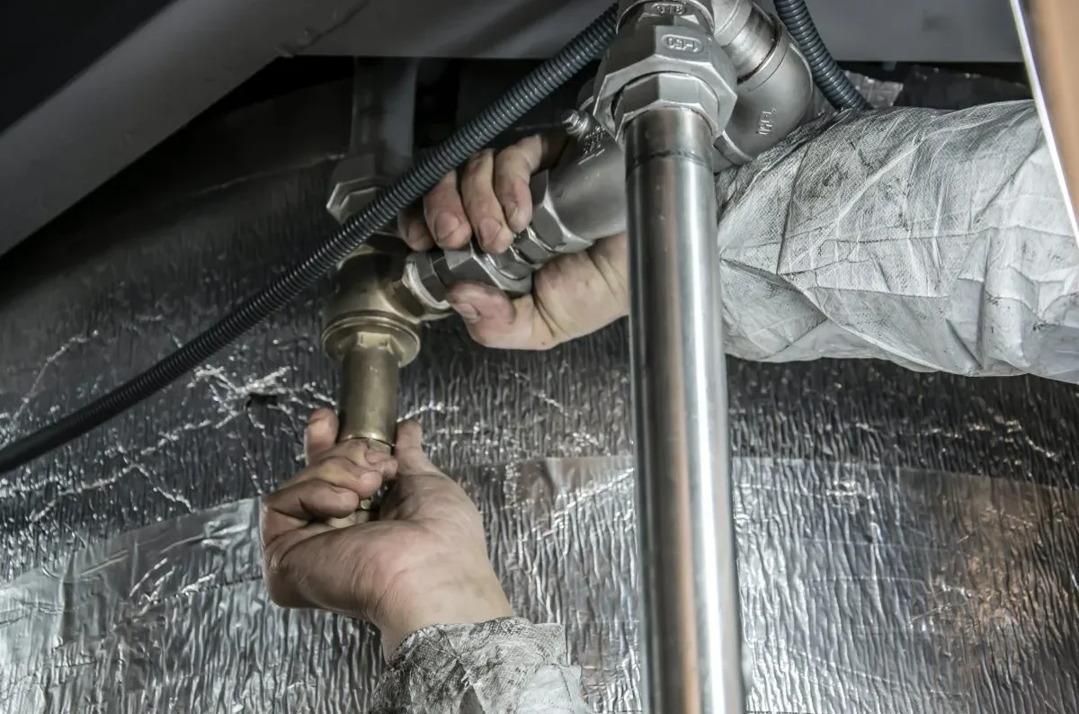 Pro adjust plumbing pipes with bare hands