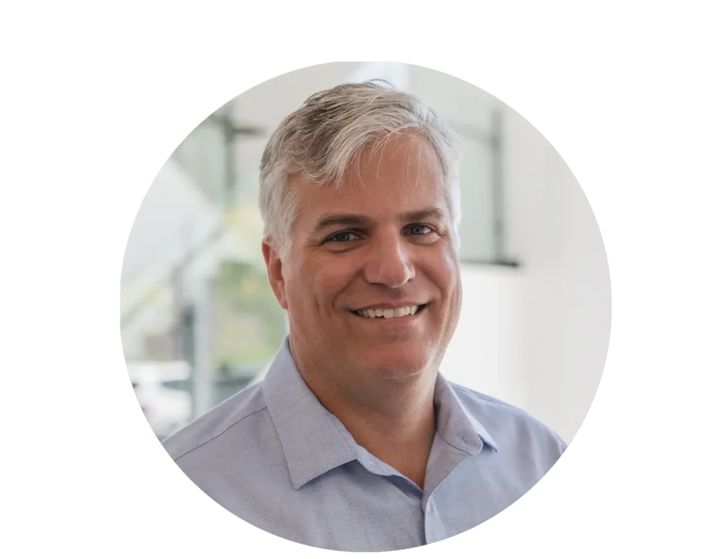- Housecall Pro HCP leadership headshot of Chief Engineering Officer Adam Perry Pelletier