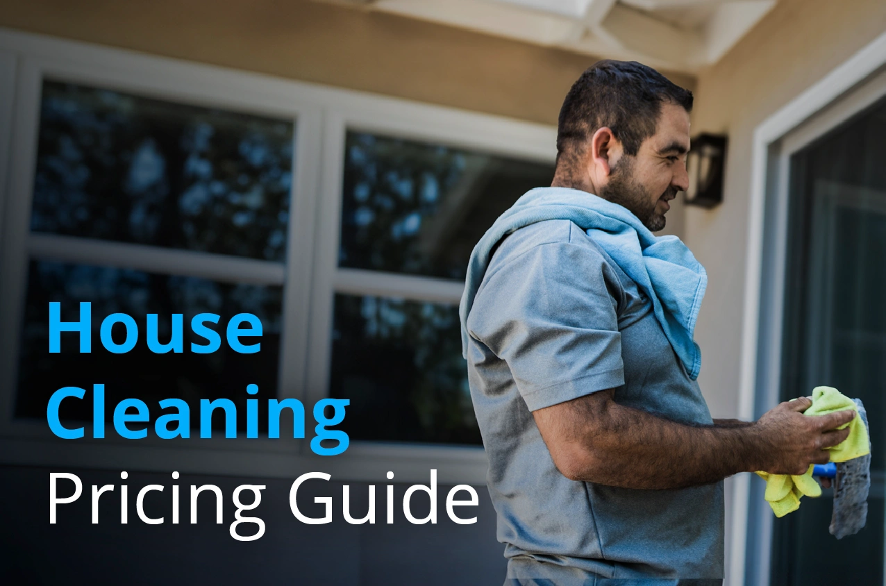 Male house cleaning pro using hand towels to dry his hands