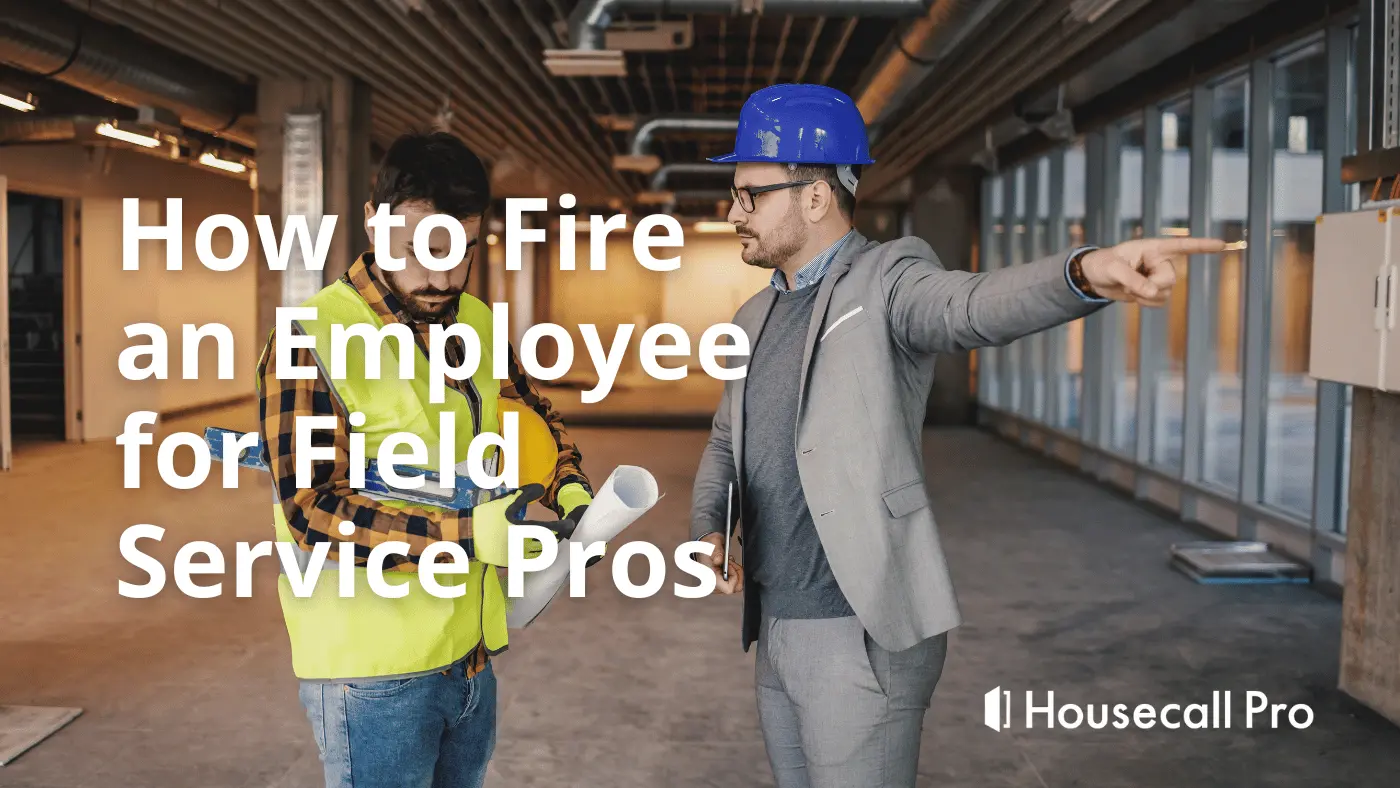 Supervisor in blue hard hat and grey suit firing employee at job site