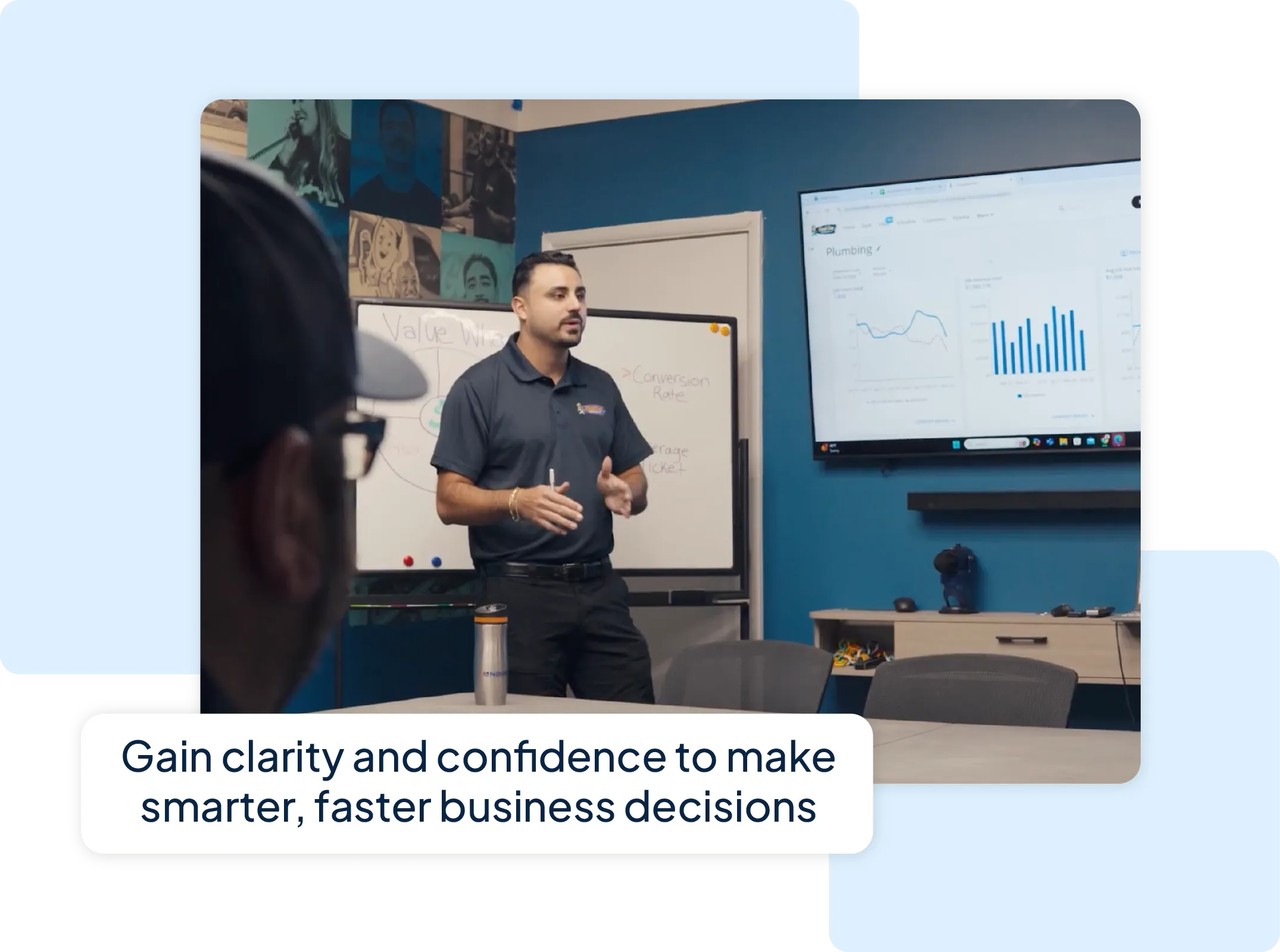 - Housecall Pro Male business coach leads training session in small office setting