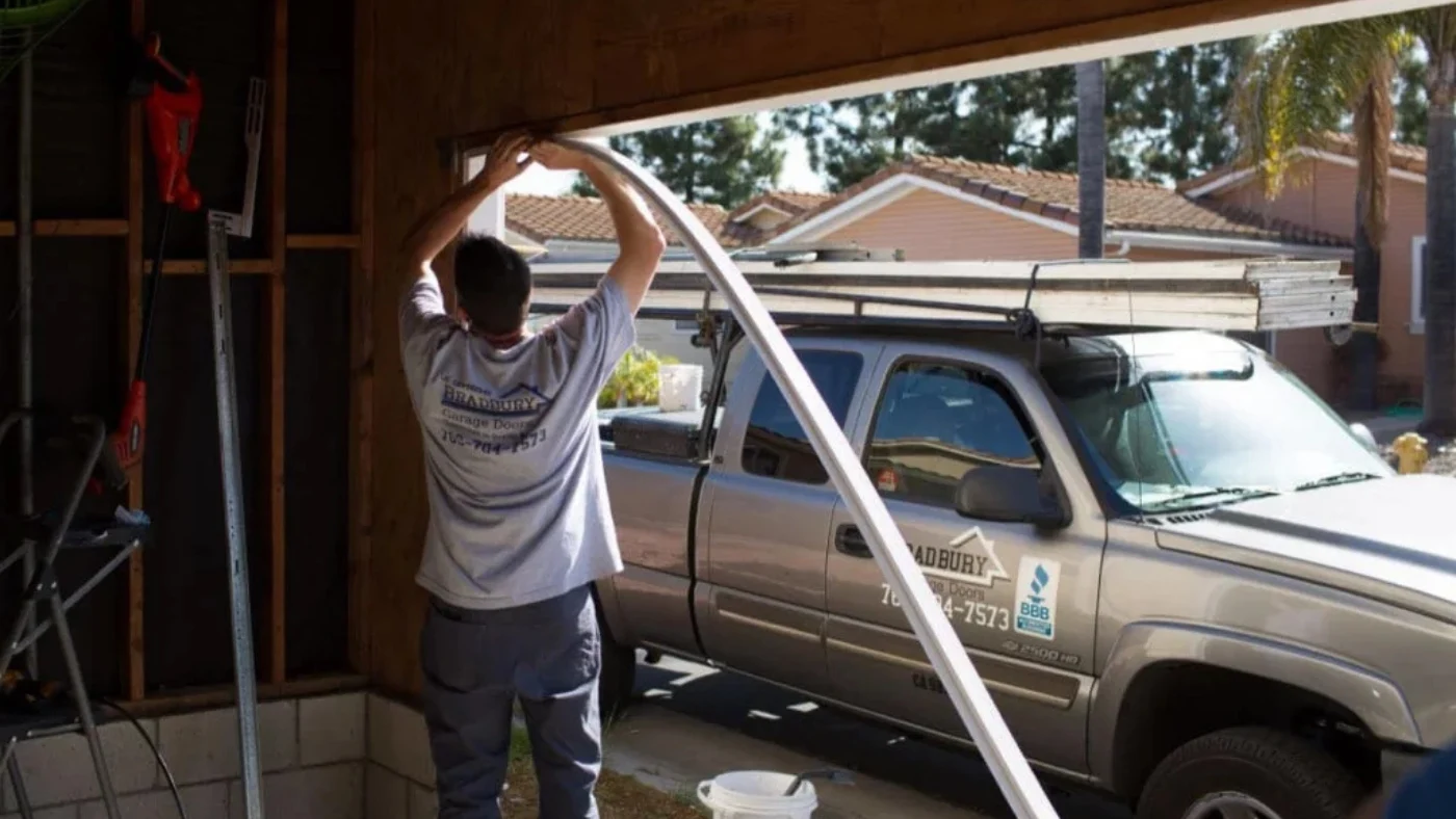 Pro fixing garage door frame