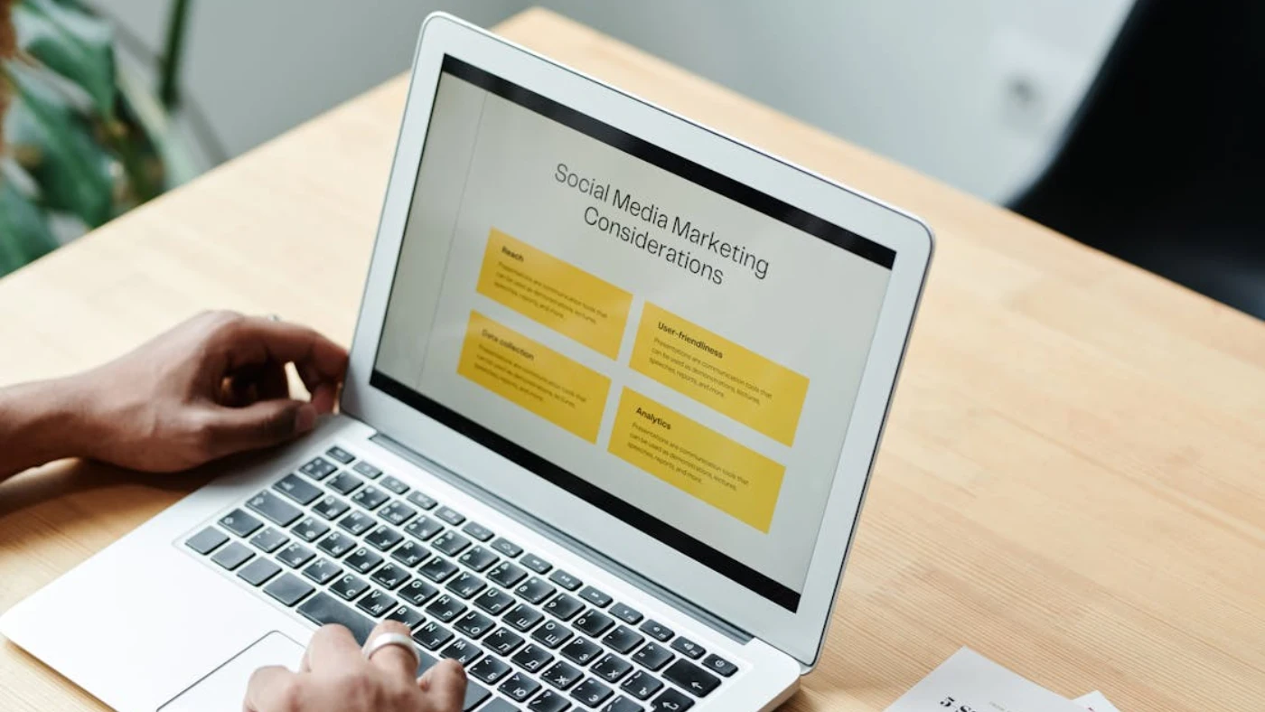 Laptop displaying social media marketing strategy presentation for home services business