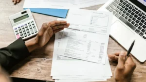 man is looking at his account statement