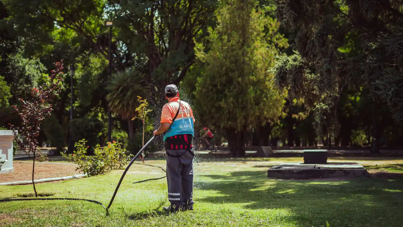 gardener watering in the garden