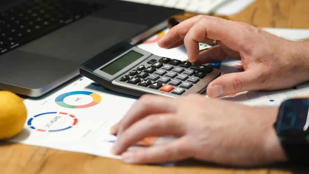 man using calculator