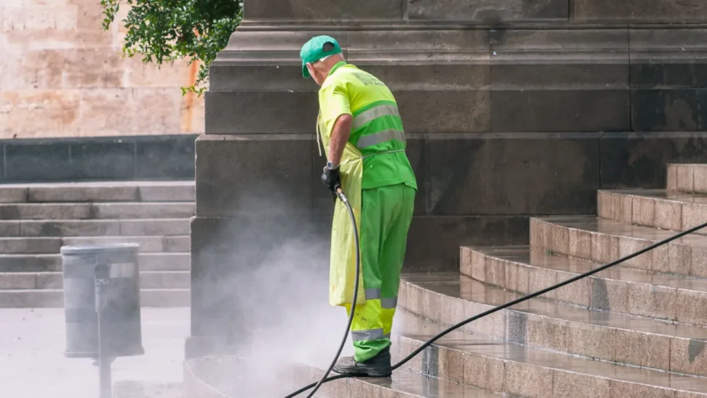 Pressure washing pro washing a staircase